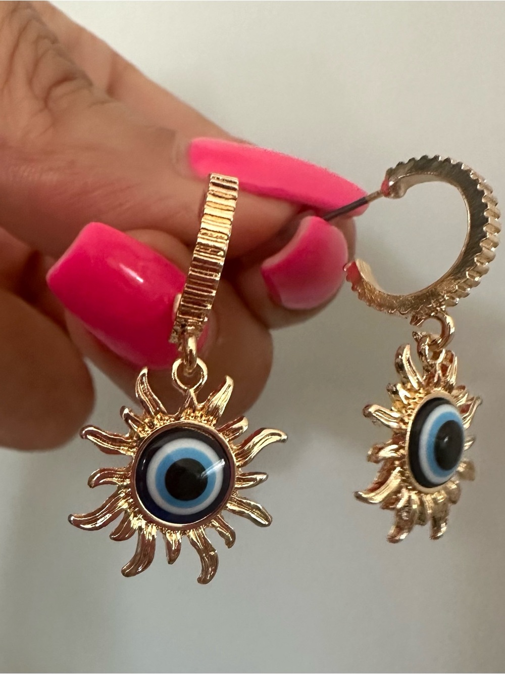 Gold Sun Hoop Earrings with Blue Evil Eye Charm
